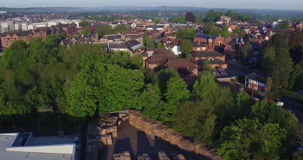 Rising aerial shot with seagulls which reveals the historic town of Tonbridge, Kent, UK