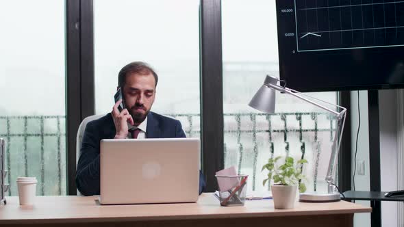 Manager Talking on the Phone