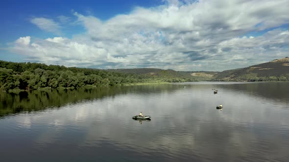 aerial view of fisherman at the boat on river. Fisherman life style.