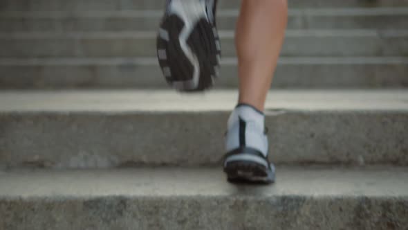 Runner Training Up Stairs Before Competition.Running Man On Step Half Marathon.Runner Man On Stairs