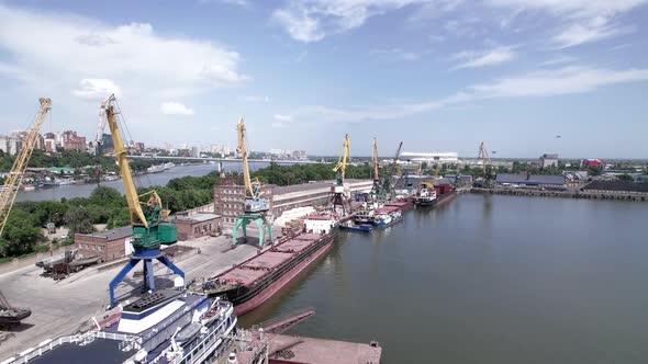 Cranes and Ships in a Dock