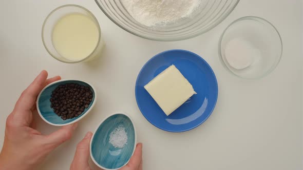 Top view of Ingredients for  homemade cookies on the white table