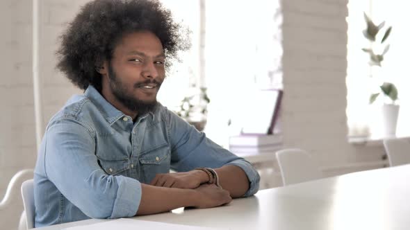 Smiling Creative African Man Looking at Camera