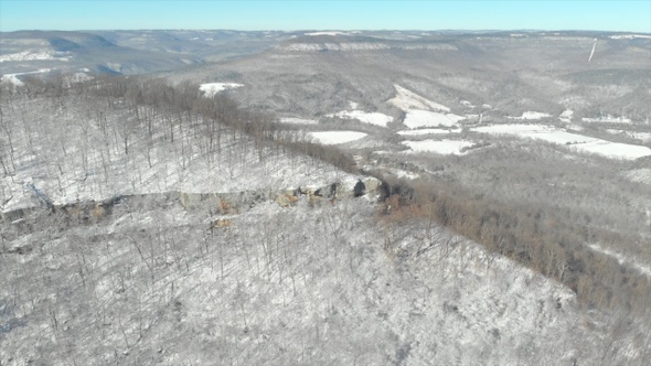 Aerial of Wilderness Mountain Ridge with Snow