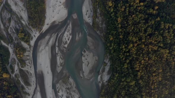 Aerial view Laba river flood, forest at dawn, autumn, natural water earth patterns, Caucasus Russia