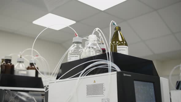 The Bottles with Special Medical Tubes and Filled with Liquid Substance Intended for Manufacturing