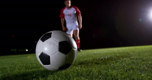 Soccer player kicking the ball 4k