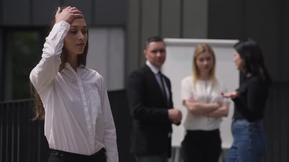 Arrogant Burnt Out Young Woman Shaking Head Making Facepalm Gesture Standing on Business Meeting