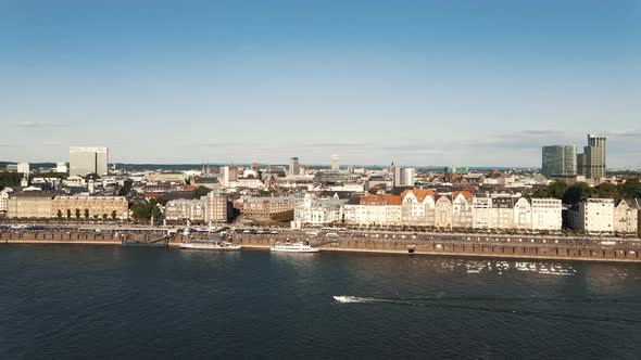 Sunny Day And Crowd At Rhine and Aerial View of the City of Dusseldorf in Germany 