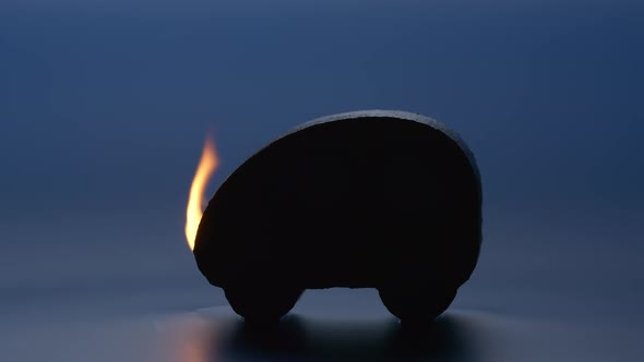 Burning toy car in a dark