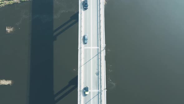 Traffic on a Narrow Road Bridge From a Birds Eye View