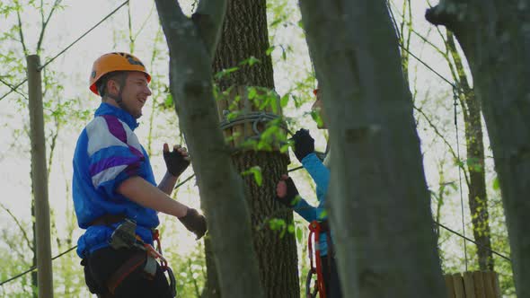 Excited couple in an adventure park