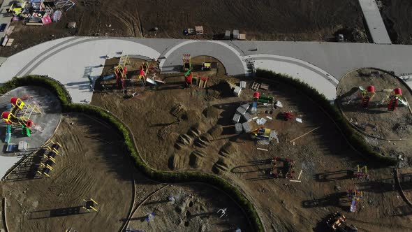 Aerial view of the playground. Aerial view of the construction site.