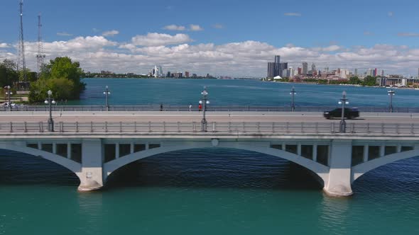 Establishing shot of the Douglas MacArthur Bridge over the Detroit river. This video was filmed in 4