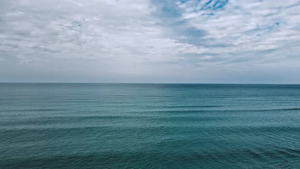 Dark Calm Sea and Sky in the Evening