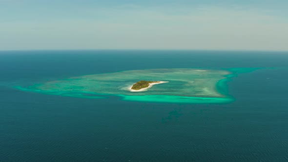 Travel Concept with a Sandy Beach and Blue Sea