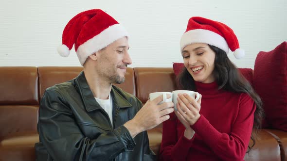 Man and woman drinking hot tea