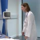 Female doctor checking on male patient - VideoHive Item for Sale