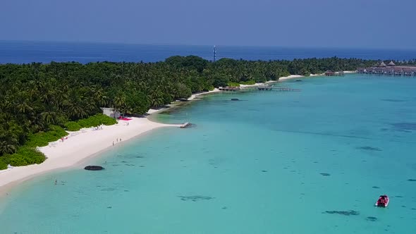 Aerial drone abstract of marine resort beach break by blue water with sand background