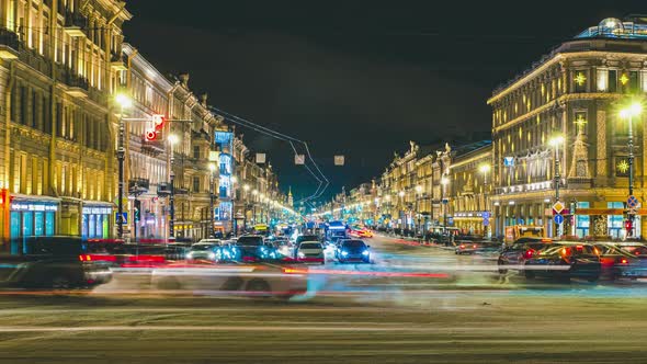 Evening Car Traffic in the City Center at the Time Lapse Intersection