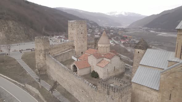 Aerial view of old Ananuri Fortress with two churches and picturesque view on river. Georgia 2021