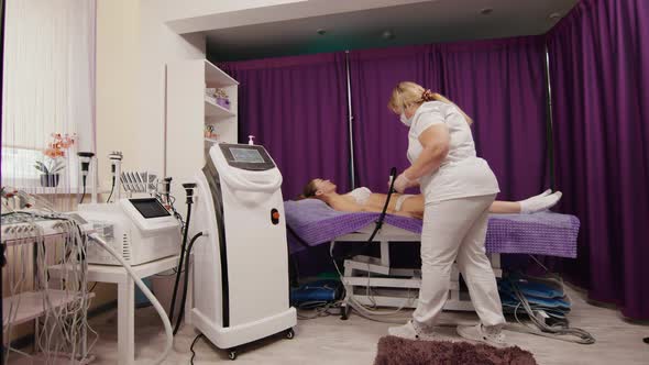 Woman Receiving Antiageing Anticellulite Massage Vacuum Rf Lifting in Spa Salon