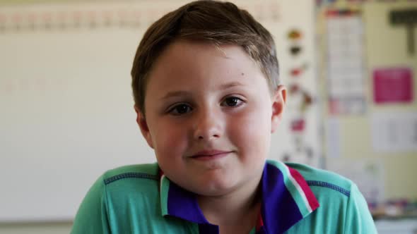 Boy smiling in the class