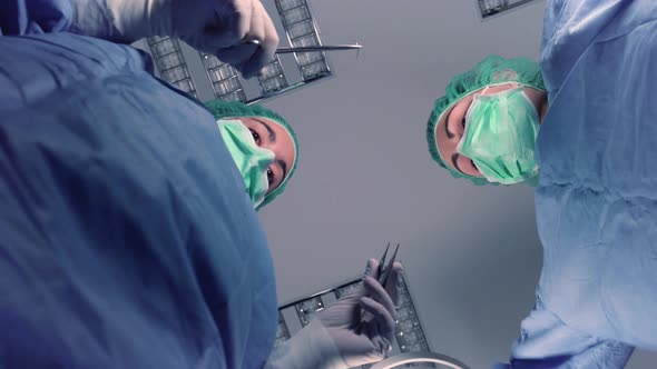 Women Performing Surgery In Hospital Together