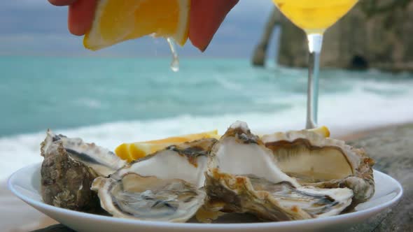 Lemon Squeezed Onto Fresh Oysters