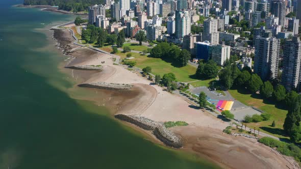 Bird's Eye View Of Sunset Beach Park Along False Creek Near Burrard Street Bridge In Downtown Vancou