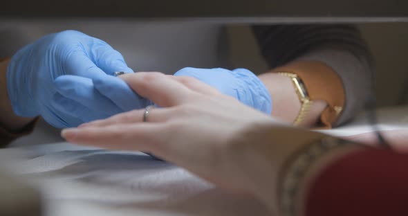 Nails manicure close up slow motion 4K alt