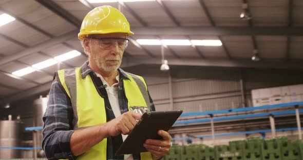 Worker using digital tablet