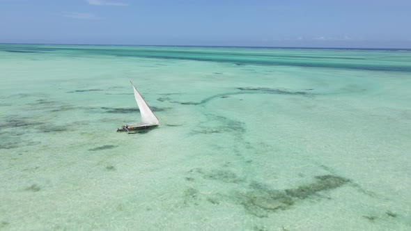 Aerial View of a Boat in the Ocean Near the Coast of Zanzibar Tanzania