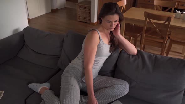 Woman in Pajamas Working From Home During a Pandemic in Slow Motion