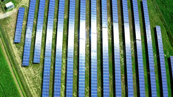 Large solar farm on green field, aerial view, Poland