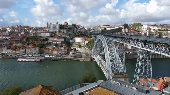Porto City With Douro River And Dom Luis Bridge With Cloudy Sky In Portugal - static shot