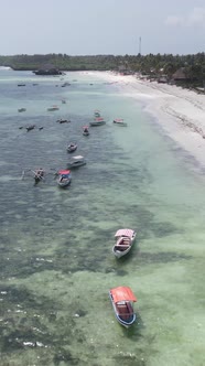 Vertical Video Boats in the Ocean Near the Coast of Zanzibar Tanzania