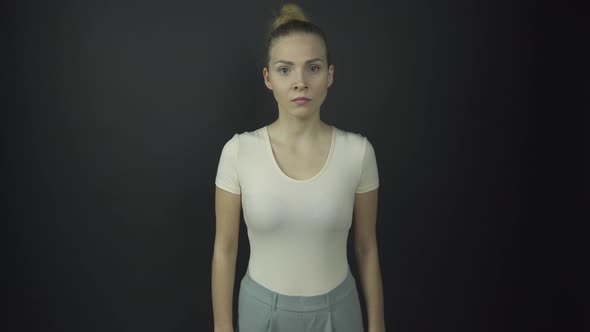 Professional Actress in T-shirt Performs Anger Emotions