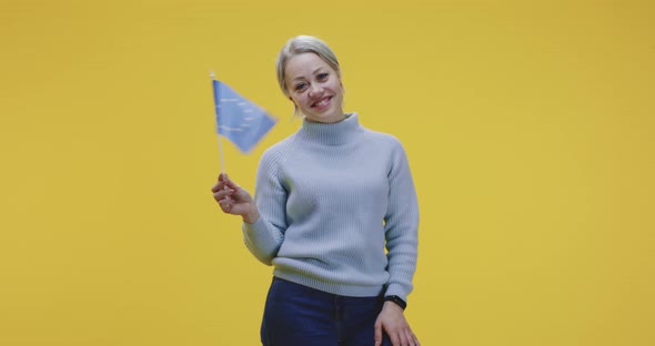 Woman Waving EU Flag