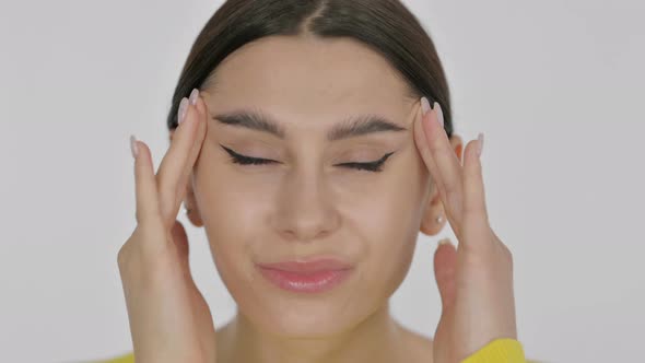 Face of Spanish Woman Having Headache