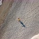 Aerial Drone Footage of a Girl Dancing at a Lonely Beach - VideoHive Item for Sale