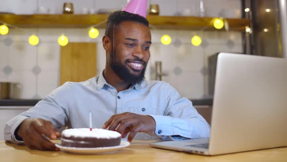 Afroamercan Celebrating Birthday Through Video Call Virtual Party with Friends