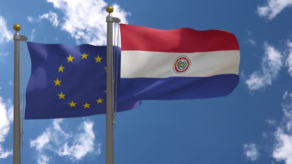 European Union Flag Vs Paraguay Flag On Flagpole