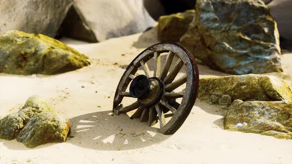 Old Tradition Waggon Wheel on the Sand