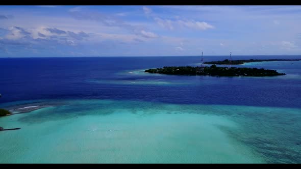 Aerial top view texture of luxury lagoon beach break by blue green sea with white sandy background o
