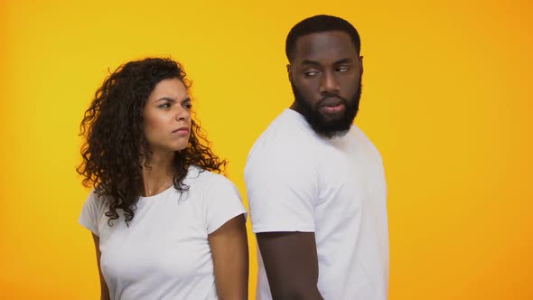Offended Multiracial Couple Looking With Anger After Quarrel Relationship Crisis