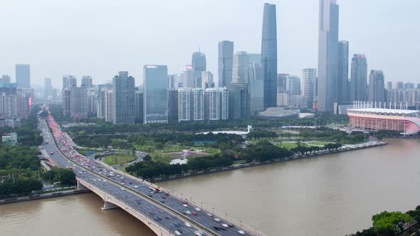 Guangzhou Business City Aerial Cityscape China Pearl River with Boats Traffic and Bridges Timelapse