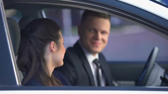 Happy Couple Smiling and Hugging in Car After First Date, Romantic Relations