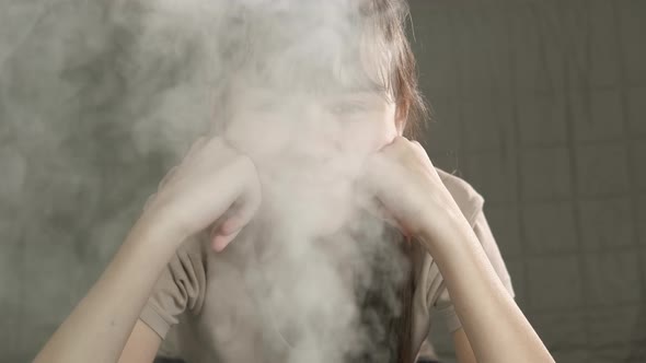 Girl Breath By Steam Humidifier