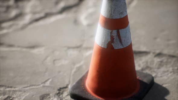 Orange and White Striped Traffic Cone